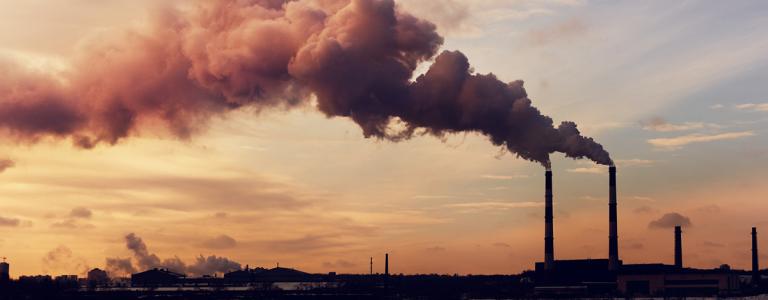 Silhouette of a power plant with smokestacks in Kiev.